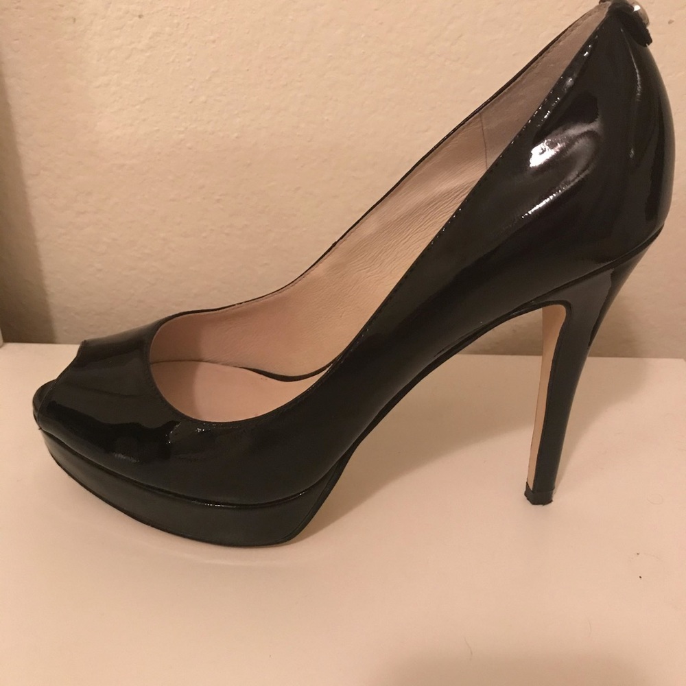 Michael Kors patent pumps